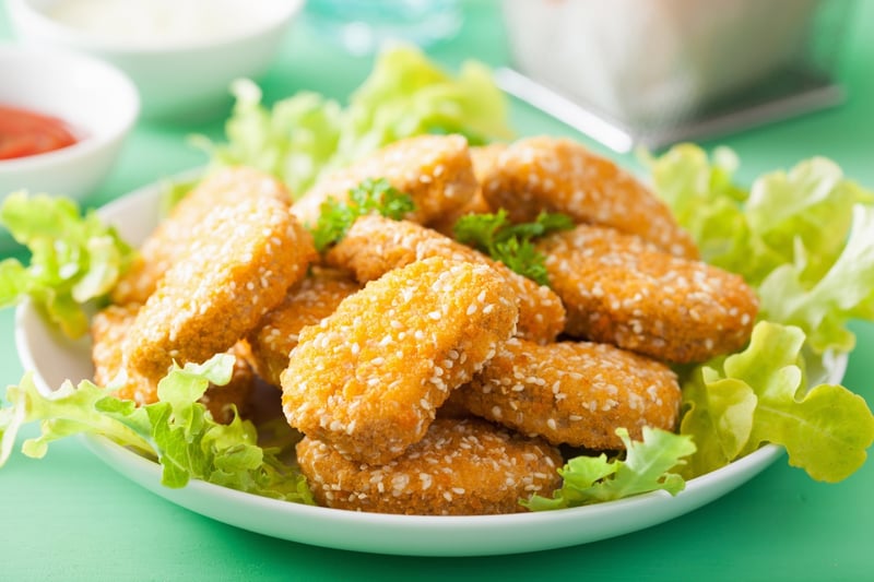 A dish of plant-based chick'n nuggets