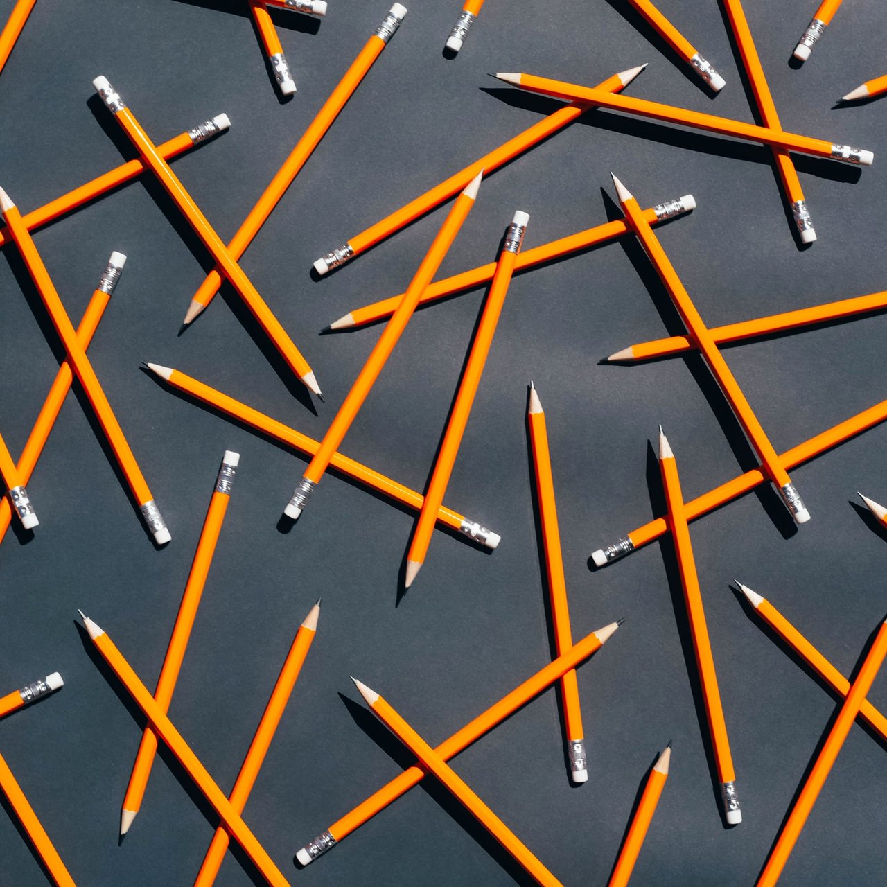 Pencils on an black background.