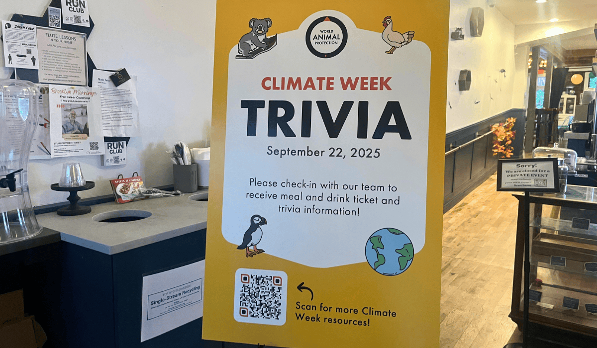 Climate Week NYC 2025 Trivia Night signage.