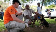 Steven Clegg met this owner and his dog - the dog had an injured shoulder which was patched up by the team.