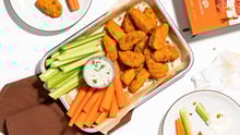jack and annie’s buffalo jackfruit wings with celery, carrots, and ranch.