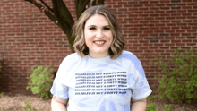 WAP team member Kara King wearing a T-shirt that says "disabled is not a dirty word."