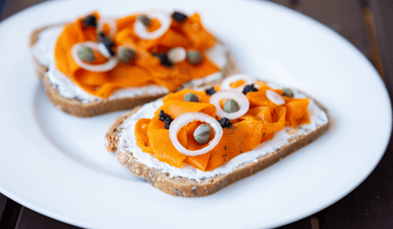 Vegan carrot lox on bread.