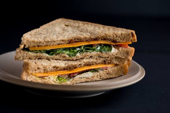 A sandwich cut in half diagonally.
