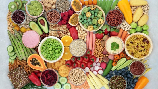 A variety of plant-based foods spread on a table.