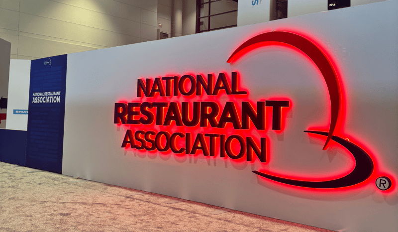 A sign for The National Restaurant Show.