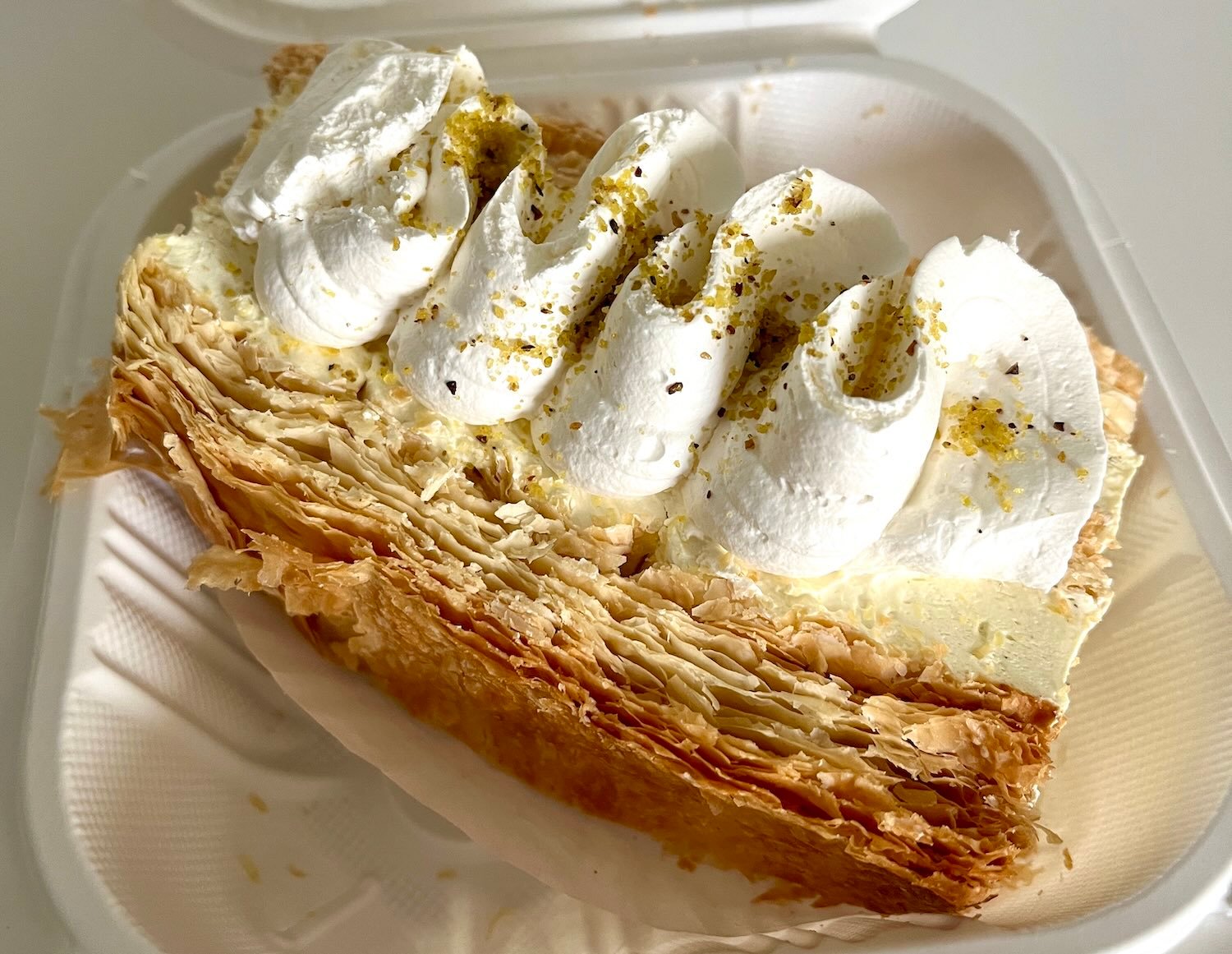 Napolean pastry in a takeout container from Tarantino's Vegan Italian.