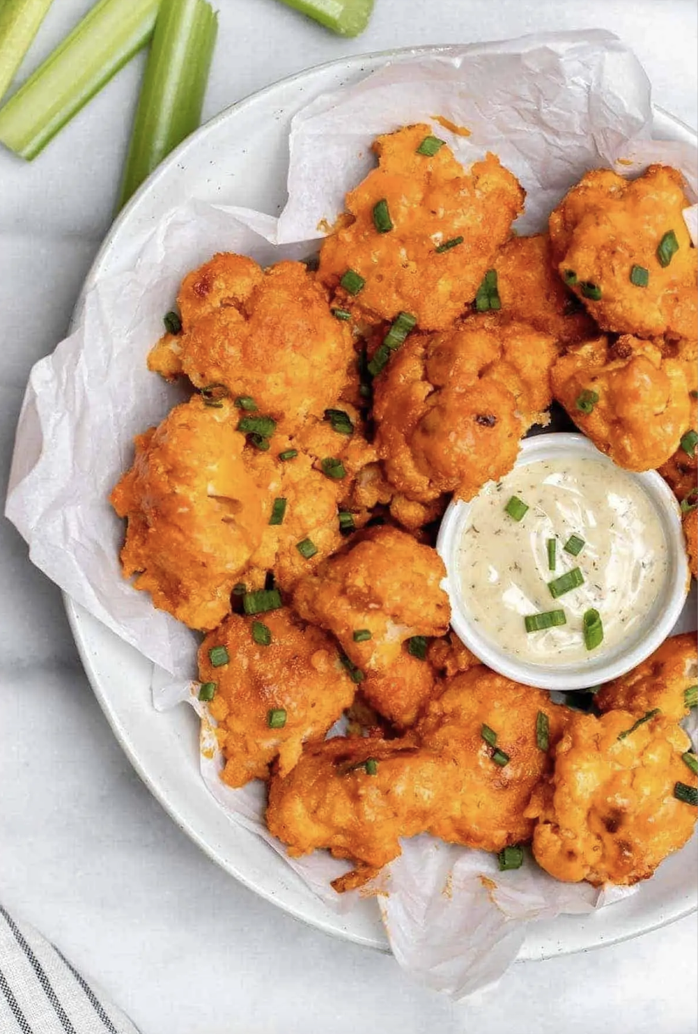 Vegan baked buffalo cauliflower wings.