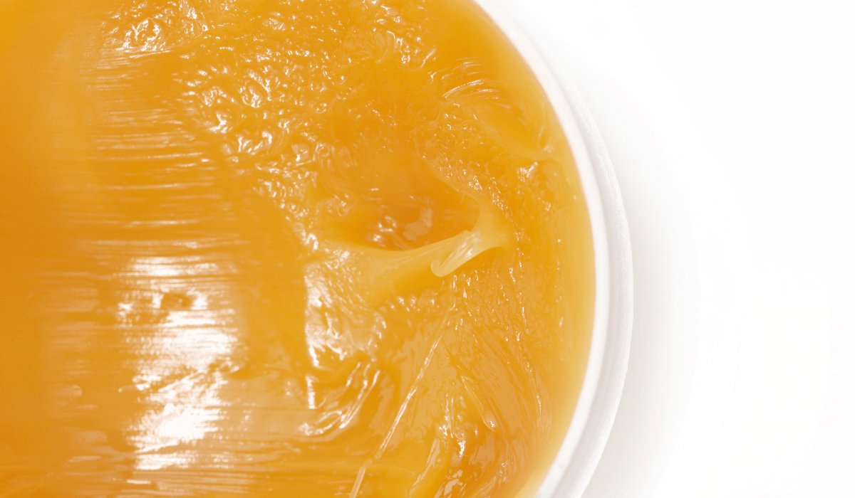 A honey-colored balm made of lanolin.